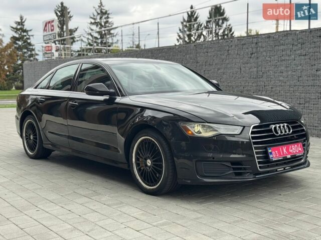 Черный Ауди А6, объемом двигателя 2 л и пробегом 180 тыс. км за 12900 $, фото 1 на Automoto.ua