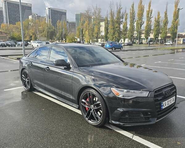 Чорний Ауді А6, об'ємом двигуна 3 л та пробігом 104 тис. км за 25900 $, фото 1 на Automoto.ua