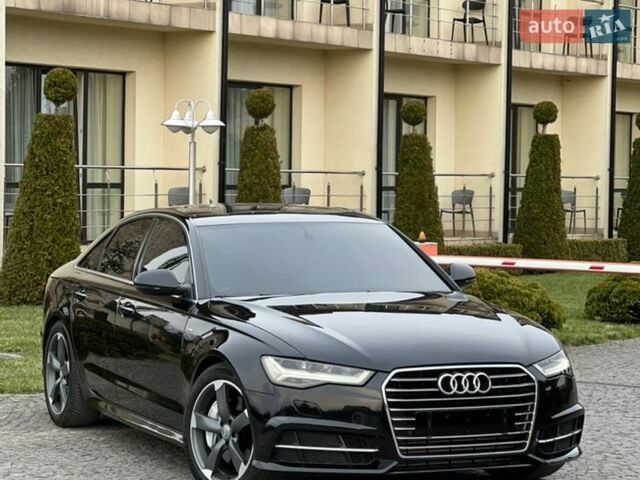 Черный Ауди А6, объемом двигателя 2 л и пробегом 163 тыс. км за 16199 $, фото 1 на Automoto.ua