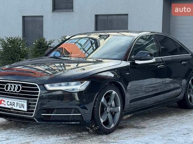 Черный Ауди А6, объемом двигателя 1.98 л и пробегом 162 тыс. км за 15500 $, фото 1 на Automoto.ua
