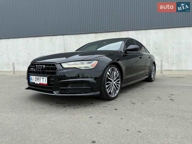 Чорний Ауді А6, об'ємом двигуна 2 л та пробігом 233 тис. км за 15990 $, фото 1 на Automoto.ua