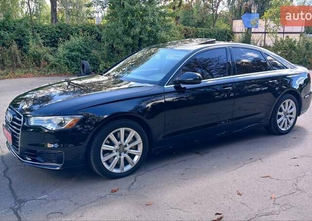 Черный Ауди А6, объемом двигателя 2 л и пробегом 270 тыс. км за 14400 $, фото 1 на Automoto.ua