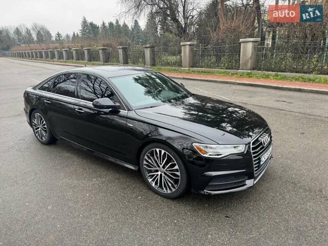 Черный Ауди А6, объемом двигателя 1.98 л и пробегом 126 тыс. км за 20300 $, фото 1 на Automoto.ua