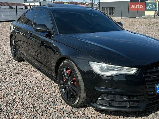 Черный Ауди А6, объемом двигателя 1.98 л и пробегом 220 тыс. км за 14900 $, фото 1 на Automoto.ua