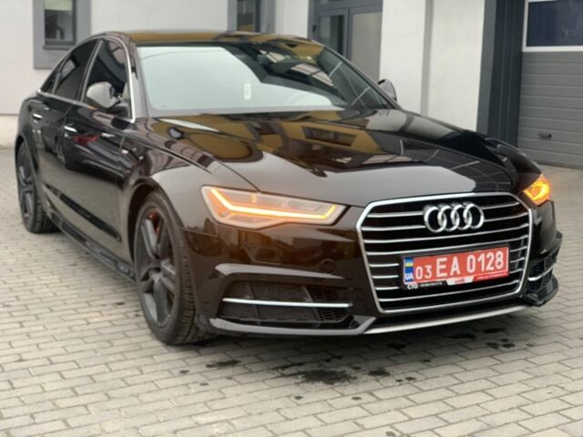 Черный Ауди А6, объемом двигателя 2 л и пробегом 165 тыс. км за 18800 $, фото 1 на Automoto.ua