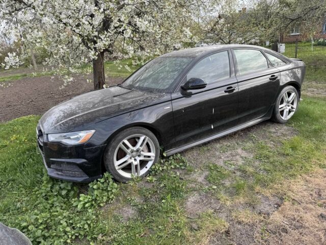 Чорний Ауді А6, об'ємом двигуна 2 л та пробігом 149 тис. км за 10996 $, фото 1 на Automoto.ua
