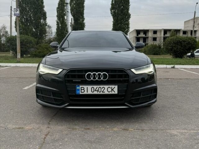 Чорний Ауді А6, об'ємом двигуна 2 л та пробігом 170 тис. км за 22999 $, фото 1 на Automoto.ua