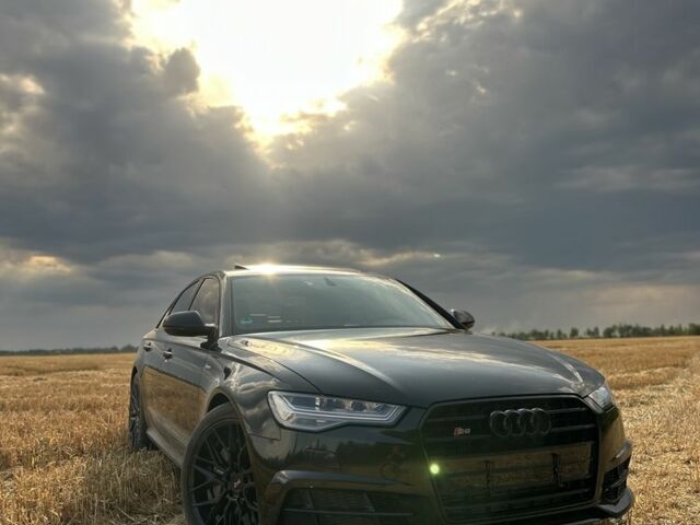 Чорний Ауді А6, об'ємом двигуна 2 л та пробігом 104 тис. км за 16990 $, фото 1 на Automoto.ua