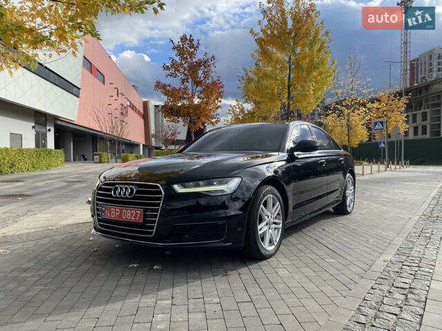 Чорний Ауді А6, об'ємом двигуна 2 л та пробігом 152 тис. км за 20500 $, фото 1 на Automoto.ua