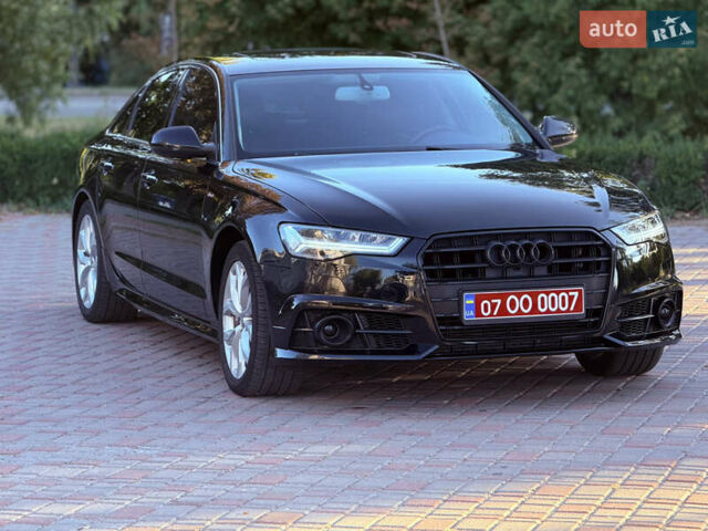 Черный Ауди А6, объемом двигателя 2 л и пробегом 189 тыс. км за 16900 $, фото 1 на Automoto.ua