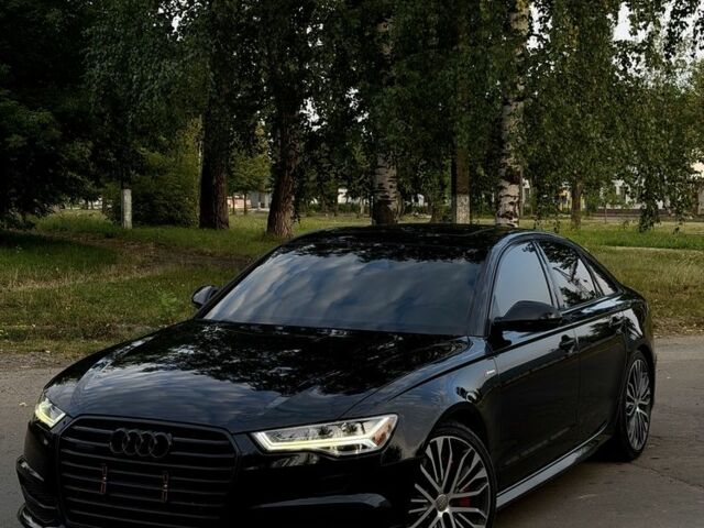 Черный Ауди А6, объемом двигателя 3 л и пробегом 152 тыс. км за 19235 $, фото 1 на Automoto.ua