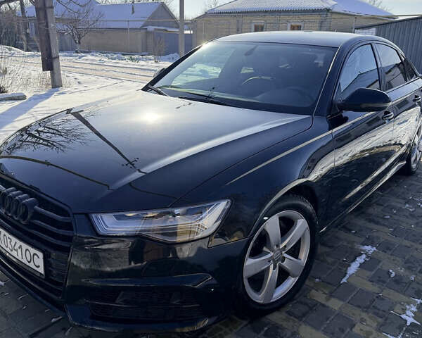 Черный Ауди А6, объемом двигателя 1.97 л и пробегом 248 тыс. км за 20300 $, фото 1 на Automoto.ua