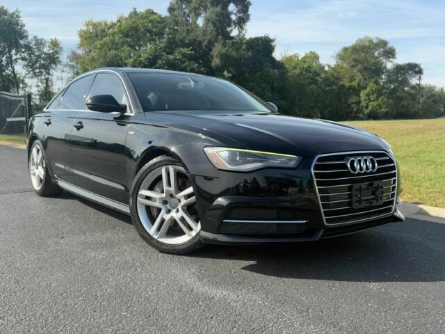 Чорний Ауді А6, об'ємом двигуна 2 л та пробігом 70 тис. км за 11600 $, фото 1 на Automoto.ua