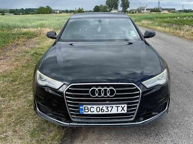 Черный Ауди А6, объемом двигателя 1.98 л и пробегом 165 тыс. км за 17000 $, фото 1 на Automoto.ua