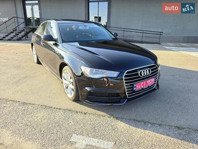 Чорний Ауді А6, об'ємом двигуна 1.98 л та пробігом 100 тис. км за 15800 $, фото 1 на Automoto.ua