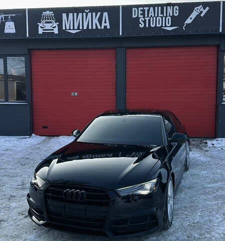 Черный Ауди А6, объемом двигателя 1.98 л и пробегом 142 тыс. км за 19300 $, фото 1 на Automoto.ua