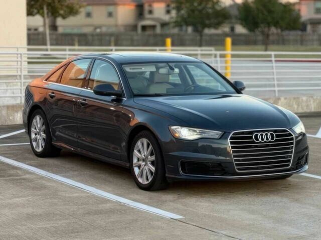 Чорний Ауді А6, об'ємом двигуна 2 л та пробігом 80 тис. км за 12200 $, фото 1 на Automoto.ua