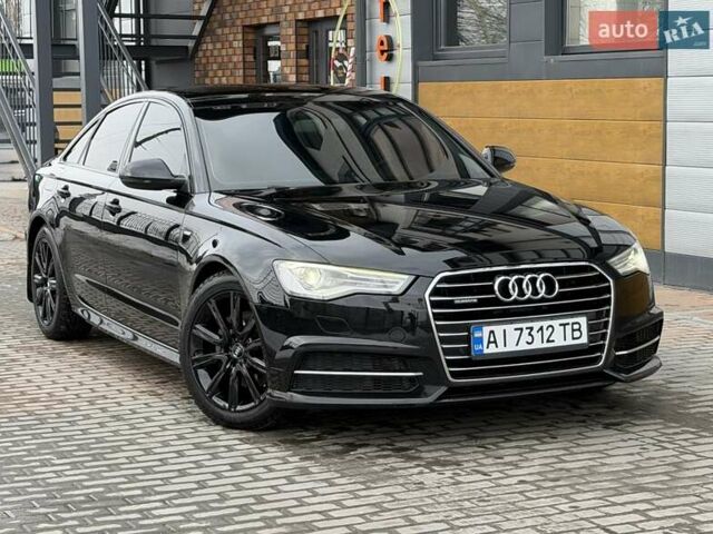 Черный Ауди А6, объемом двигателя 1.97 л и пробегом 196 тыс. км за 23000 $, фото 1 на Automoto.ua