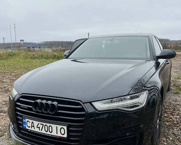 Черный Ауди А6, объемом двигателя 2 л и пробегом 122 тыс. км за 24000 $, фото 1 на Automoto.ua
