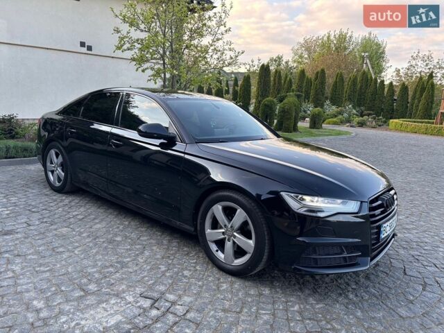 Черный Ауди А6, объемом двигателя 1.97 л и пробегом 257 тыс. км за 19999 $, фото 1 на Automoto.ua