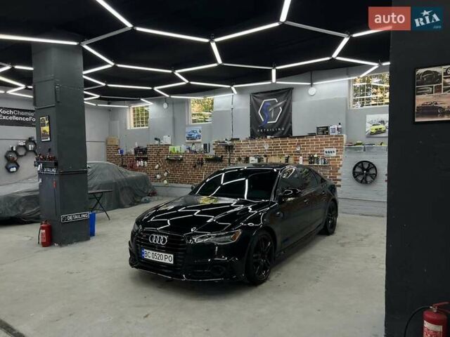 Черный Ауди А6, объемом двигателя 1.98 л и пробегом 148 тыс. км за 24000 $, фото 1 на Automoto.ua