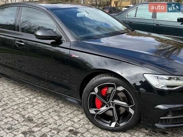 Черный Ауди А6, объемом двигателя 3 л и пробегом 170 тыс. км за 23700 $, фото 1 на Automoto.ua