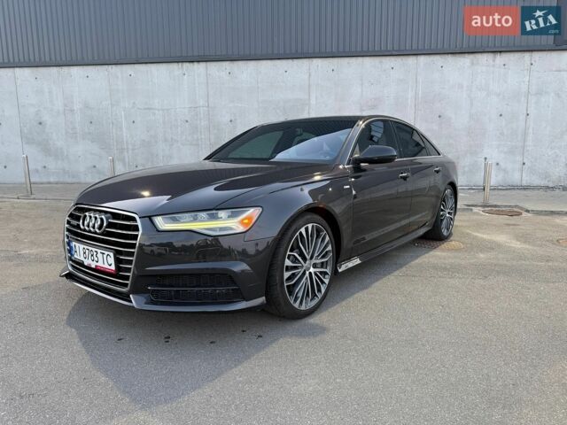 Чорний Ауді А6, об'ємом двигуна 2 л та пробігом 231 тис. км за 17500 $, фото 1 на Automoto.ua