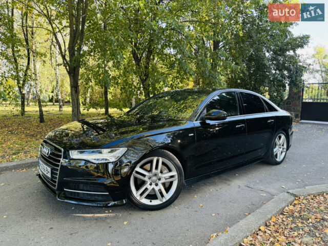 Черный Ауди А6, объемом двигателя 2 л и пробегом 79 тыс. км за 18800 $, фото 1 на Automoto.ua