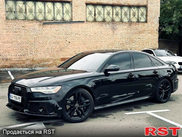 Черный Ауди А6, объемом двигателя 4 л и пробегом 0 тыс. км за 24500 $, фото 1 на Automoto.ua