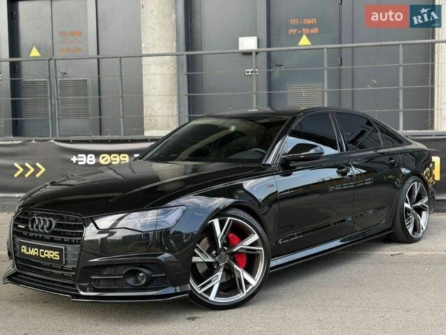 Чорний Ауді А6, об'ємом двигуна 2 л та пробігом 125 тис. км за 23000 $, фото 1 на Automoto.ua