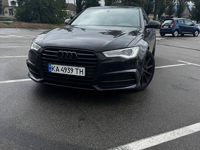 Черный Ауди А6, объемом двигателя 1.98 л и пробегом 158 тыс. км за 17500 $, фото 1 на Automoto.ua