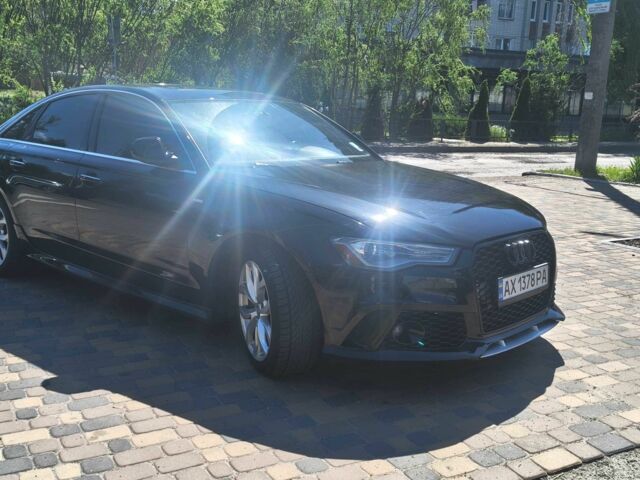 Черный Ауди А6, объемом двигателя 2 л и пробегом 148 тыс. км за 17000 $, фото 1 на Automoto.ua