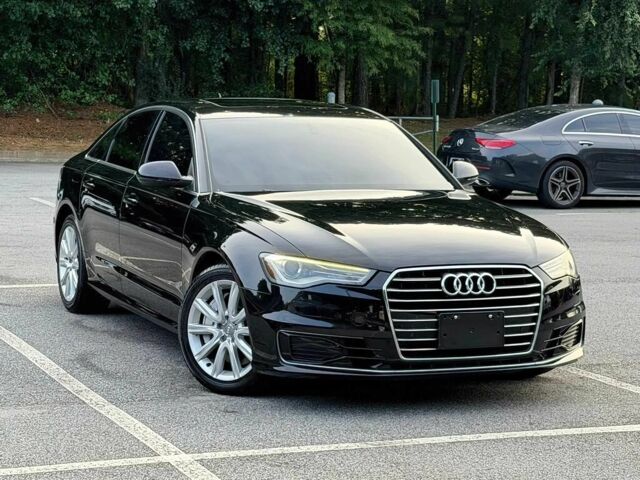 Чорний Ауді А6, об'ємом двигуна 2 л та пробігом 105 тис. км за 4997 $, фото 1 на Automoto.ua