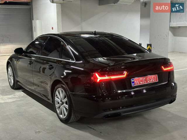 Чорний Ауді А6, об'ємом двигуна 2 л та пробігом 259 тис. км за 14300 $, фото 1 на Automoto.ua