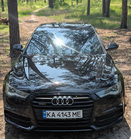 Черный Ауди А6, объемом двигателя 1.98 л и пробегом 142 тыс. км за 22500 $, фото 1 на Automoto.ua