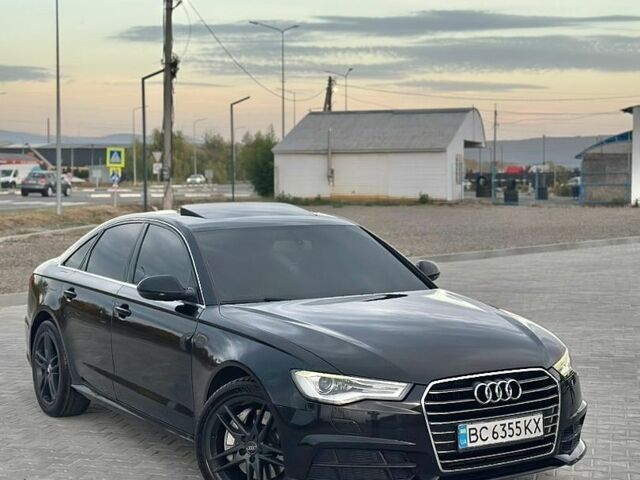 Чорний Ауді А6, об'ємом двигуна 2 л та пробігом 170 тис. км за 12900 $, фото 1 на Automoto.ua