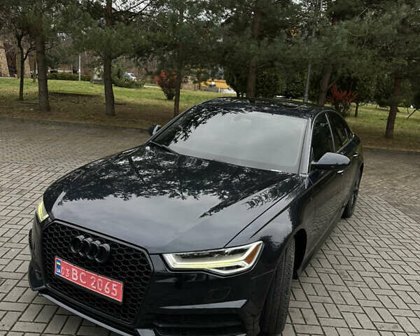 Черный Ауди А6, объемом двигателя 1.98 л и пробегом 185 тыс. км за 17999 $, фото 1 на Automoto.ua