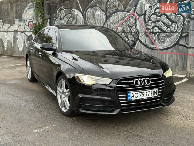 Черный Ауди А6, объемом двигателя 1.98 л и пробегом 200 тыс. км за 16700 $, фото 1 на Automoto.ua