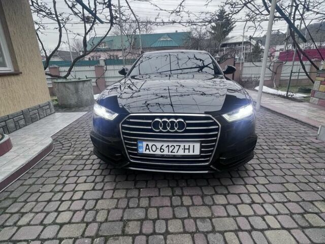 Черный Ауди А6, объемом двигателя 2 л и пробегом 284 тыс. км за 19100 $, фото 1 на Automoto.ua