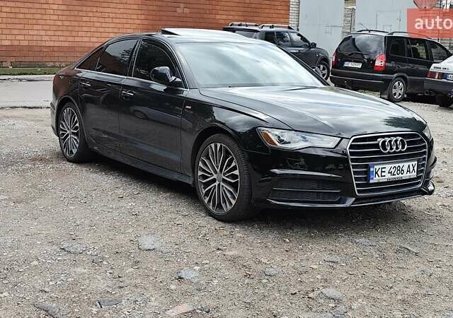 Черный Ауди А6, объемом двигателя 1.98 л и пробегом 185 тыс. км за 18000 $, фото 1 на Automoto.ua
