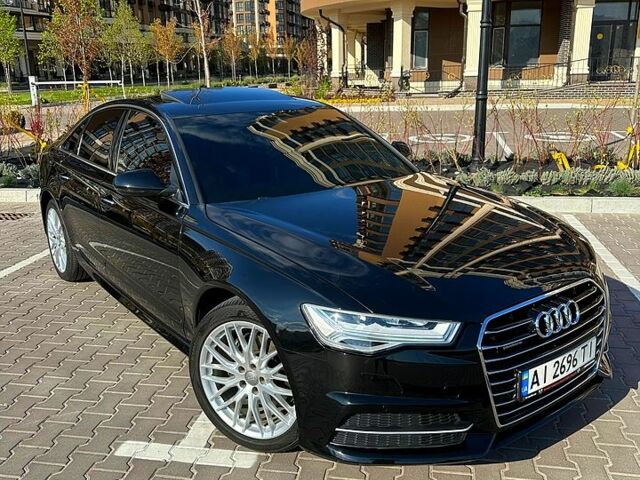 Чорний Ауді А6, об'ємом двигуна 2 л та пробігом 113 тис. км за 24700 $, фото 1 на Automoto.ua
