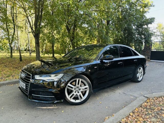 Черный Ауди А6, объемом двигателя 2 л и пробегом 78 тыс. км за 18935 $, фото 1 на Automoto.ua