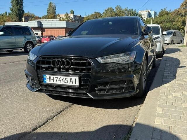 Черный Ауди А6, объемом двигателя 1.98 л и пробегом 210 тыс. км за 16500 $, фото 1 на Automoto.ua
