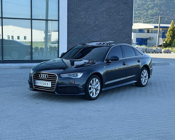 Черный Ауди А6, объемом двигателя 2 л и пробегом 240 тыс. км за 16800 $, фото 1 на Automoto.ua