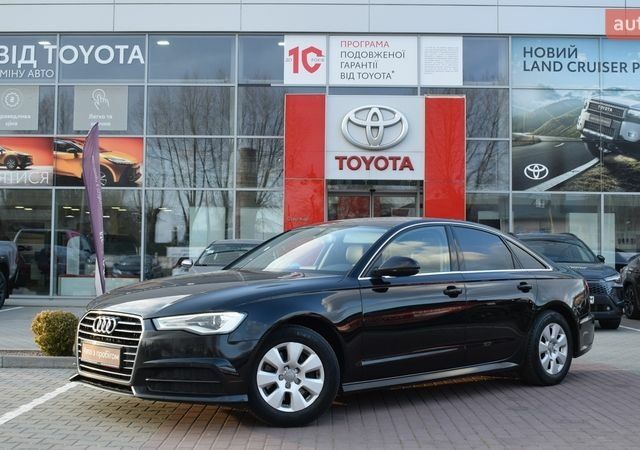 Черный Ауди А6, объемом двигателя 1.8 л и пробегом 200 тыс. км за 16200 $, фото 1 на Automoto.ua