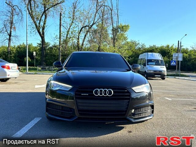 Черный Ауди А6, объемом двигателя 3 л и пробегом 105 тыс. км за 27000 $, фото 1 на Automoto.ua