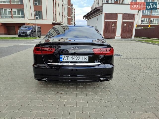 Черный Ауди А6, объемом двигателя 1.98 л и пробегом 142 тыс. км за 18300 $, фото 1 на Automoto.ua