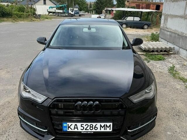 Чорний Ауді А6, об'ємом двигуна 1.98 л та пробігом 105 тис. км за 18500 $, фото 1 на Automoto.ua