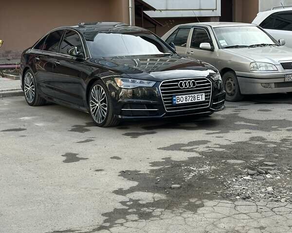 Черный Ауди А6, объемом двигателя 1.98 л и пробегом 149 тыс. км за 17000 $, фото 1 на Automoto.ua