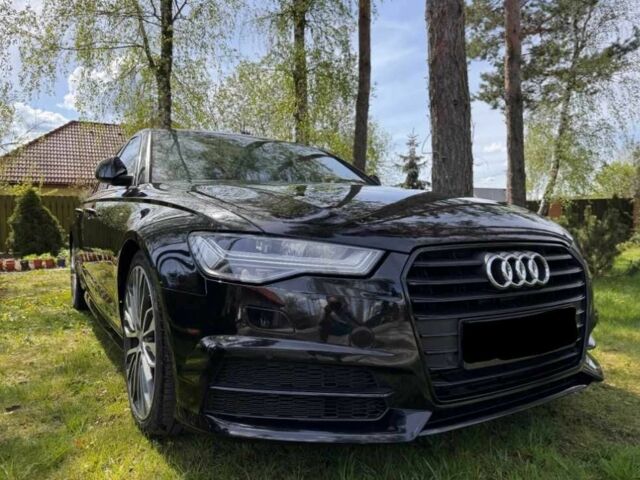 Черный Ауди А6, объемом двигателя 2 л и пробегом 127 тыс. км за 12000 $, фото 1 на Automoto.ua